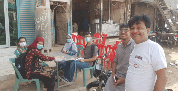The research team on ground, taking a break from the survey for Karachi Water Project at Habib University