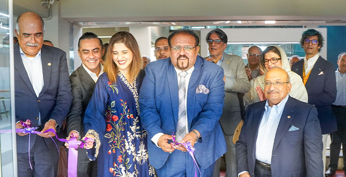Mr. Mohamedtaki cut the ribbon, symbolizing the beginning of a new chapter for the Institute.
