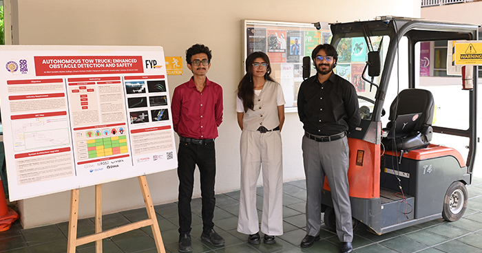 engineering students presenting autonomous vehicle safety project at Habib University