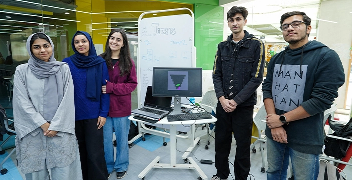 five cs students posing for a picture 